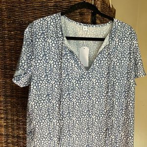 Made with Love blouse. Blue and white short sleeves with v-collar.